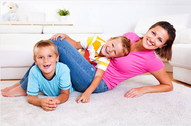 family on carpet